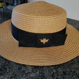 Classically Designed Straw Hat with Black Band and Metal Bee Details